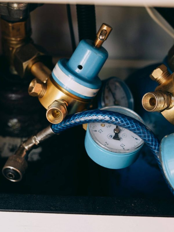 pexels-mikhail-nilov-8943269 (1) pressure gage under benchtop